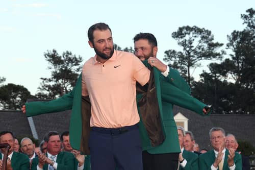 Scottie Scheffler receives his Green Jacket from 2023 winner Jon Rahm of Spain after becoming a multiple Masters champion at Augusta National last Sunday. Picture: Jamie Squire/Getty Images.