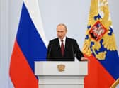Russian President Vladimir Putin gives a speech during a ceremony formally annexing four regions of Ukraine Russian troops occupy, at the Kremlin in Moscow.