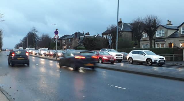 The Scottish Government has committed to cutting traffic by one fifth within nine years. Picture: The Scotsman