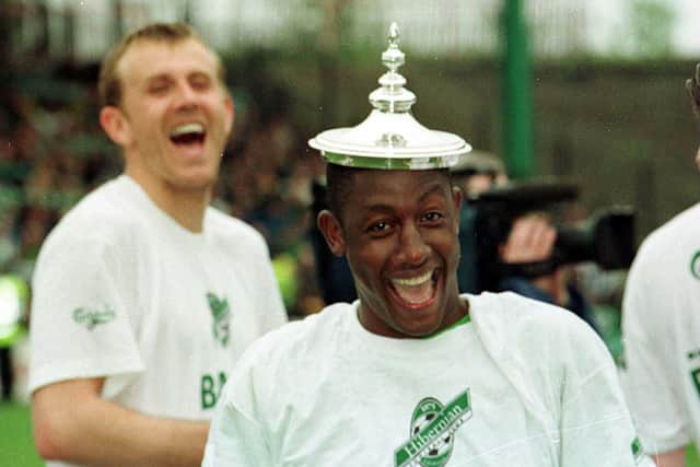 Latapy celebrates Hibs promotion to the SPL as team mate Franck Sauzee looks on. Pic: SNS