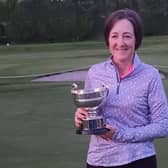 Stirling's Alison Davidson shows off the trophy after landing a tenth triumph in the Stirling & Clackmannan Ladies ' Championship at Bathgate.