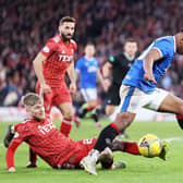 Rangers striker Alfredo Morelos tries to get the better of Aberdeen defender Hayden Coulson.