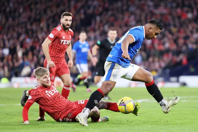 Rangers striker Alfredo Morelos tries to get the better of Aberdeen defender Hayden Coulson.