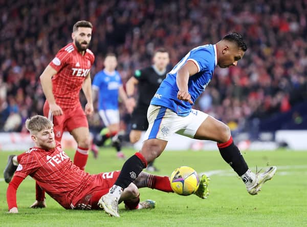Rangers striker Alfredo Morelos tries to get the better of Aberdeen defender Hayden Coulson.