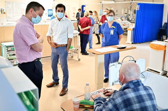 Scottish clinical director Jason Leitch, seen with Health Secretary Humza Yousaf during a visit to Monklands Hospital, is a world-leading expert, says Harry Burns (Picture: Jeff J Mitchell/Getty Images)