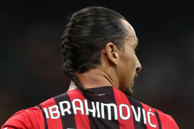 Zlatan Ibrahimovic of AC Milan looks on during the Serie A match between AC Milan and SS Lazio at Stadio Giuseppe Meazza on September 12, 2021 in Milan, Italy. (Photo by Marco Luzzani/Getty Images)