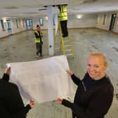 Laura Proudfoot and Marcella Macdonald checking out the plans for the new academy.