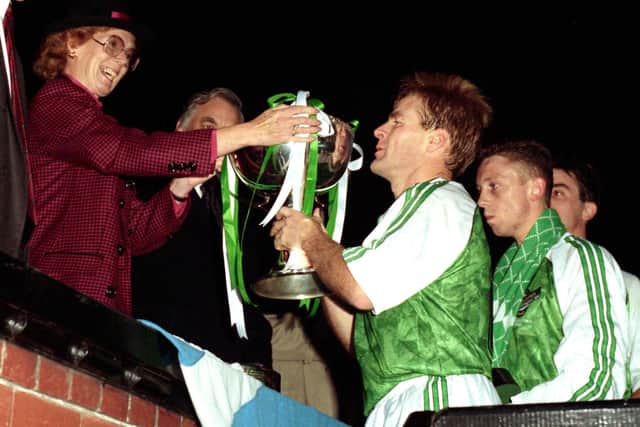 Hibs' Murdo MacLeod is presented with the League Cup in 1991, following the Leith side's 2-0 victory over Dunfermline. Photo by SNS Group