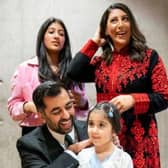 Newly elected First Minister Humza Yousaf with wife Nadia El-Nakla, daughter Amal and stepdaughter Maya (Picture: Jane Barlow/Pool/AFP via Getty)