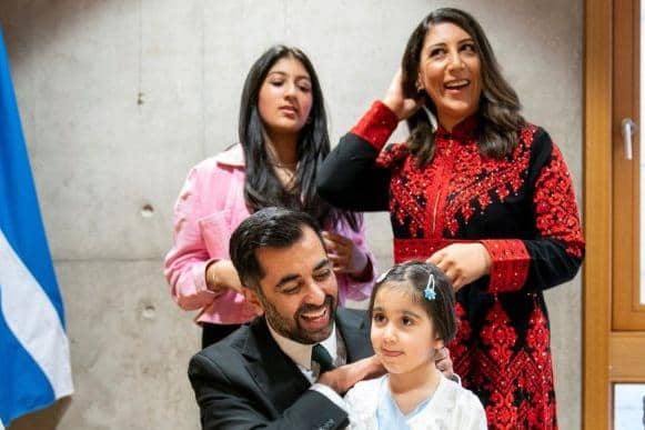 Newly elected First Minister Humza Yousaf with wife Nadia El-Nakla, daughter Amal and stepdaughter Maya (Picture: Jane Barlow/Pool/AFP via Getty)