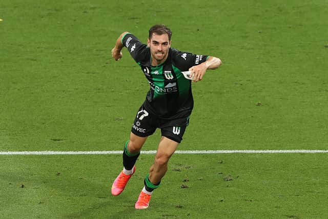 Ben Garuccio of Western United celebrates after scoring his scorpion goal.