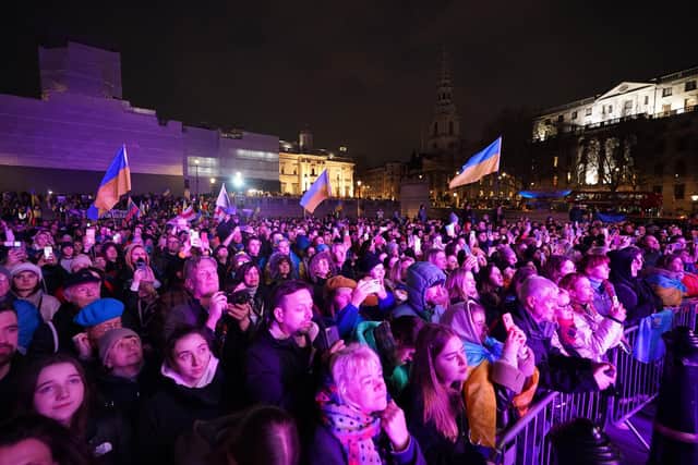 Crowds during a United With Ukraine: vigil, to mark one year of war in Ukraine, at Trafalgar Square, London. Picture date: Thursday February 23, 2023.