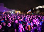 Crowds during a United With Ukraine: vigil, to mark one year of war in Ukraine, at Trafalgar Square, London. Picture date: Thursday February 23, 2023.