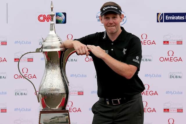 Stephen Gallacher poses wih the iconic coffee pot trophy after winning the Omega Dubai Desert Classic for the second year running in 2014. Picture: Francois Nel/Getty Images.