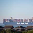HMM Algeciras, the world's largest container ship, passes Canvey Island in Essex as it arrives in the UK for the first time.