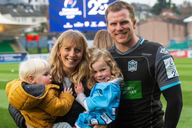 Chris Fusaro with his wife Katie and family on the ptich at Scotstoun. Picture: Bill Murray/SNS