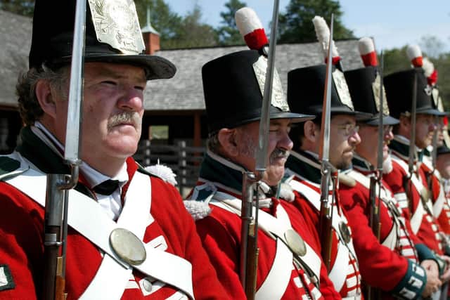 Redcoats in the War of 1812, as depicted by re-enactors, and other conflicts included many Scots among their ranks (Picture: Mark Wilson/Getty Images)