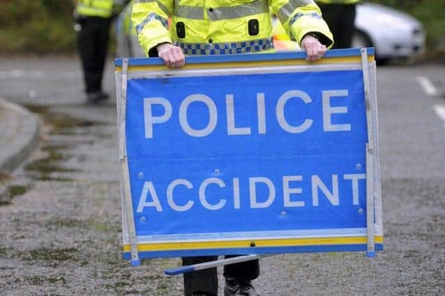 A car caught fire on the M8 in Glasgow after colliding with the crash barrier.