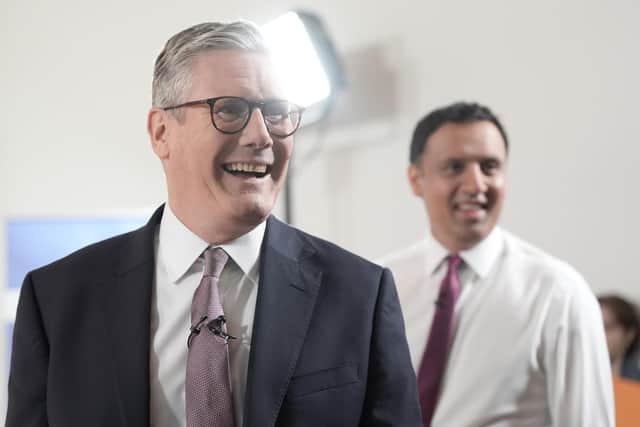 Labour Party leader Sir Keir Starmer (left) and Scottish Labour leader Anas Sarwar at a launch event for Labour's six steps for change - their doorstep offer to Scots - at the Beacons Art Centre in Custom House Quay, Greenock. Picture: Stefan Rousseau/PA Wire