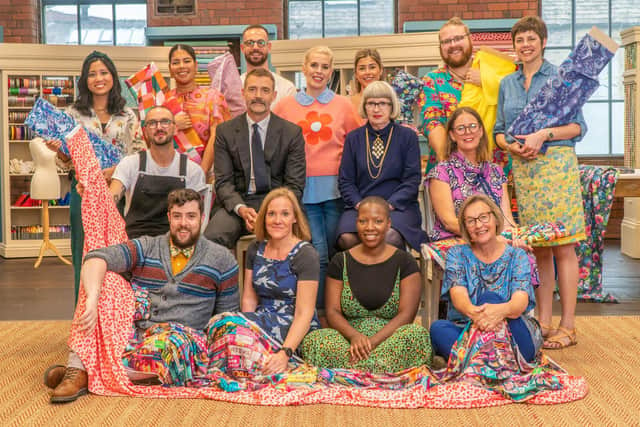 Esme with the current sewers on the current series of BBC One's The Great British Sewing Bee. (L-R) Standing - Man Yee, Annie, Cristian, presenter Sara Pascoe, Brogan, Mitch, Marni. (L-R) Sitting centre - Steve, judges Patrick Grant and Esme Young, Debra. (L-R) Sitting on floor - Richy, Gill, Chichi, Angela. Pic: BBC/Love Productions/Mark Bourdi