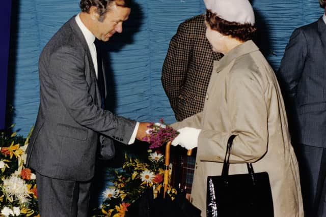 Stewart MacLeod greets Queen Elizabeth II at the opening of the Kylesku Bridge