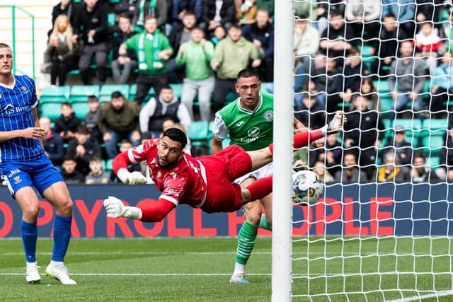 Lewis Miller heads home Hibs' opener in the 2-0 win over St Johnstone. (Photo by Ross Parker / SNS Group)