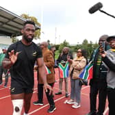 South Africa captain Siya Kolisi greets fans during a South Africa training session.