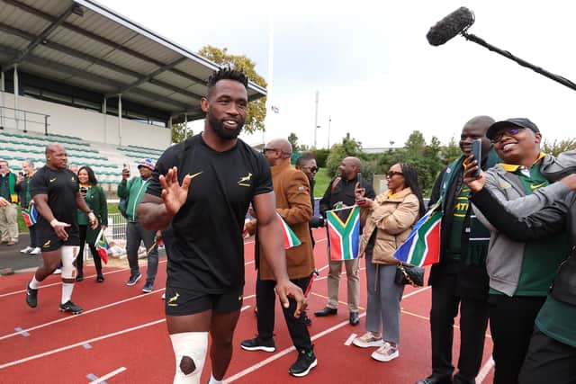 South Africa captain Siya Kolisi greets fans during a South Africa training session.