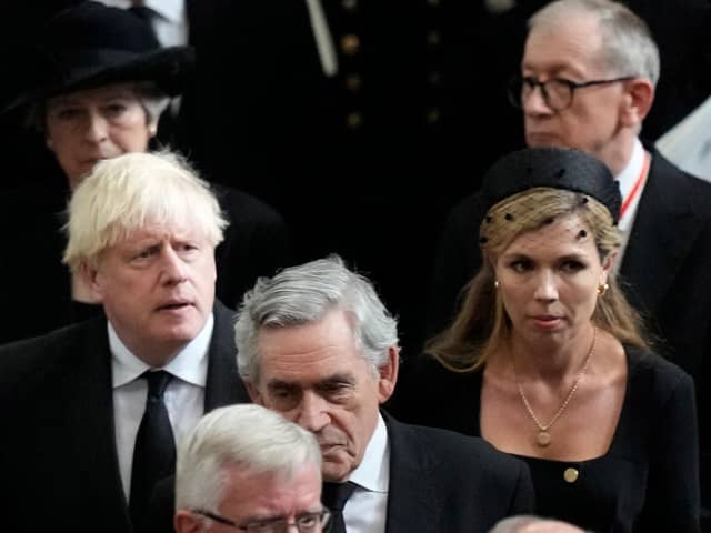 Former British Prime Minister Boris Johnson, centre left, as his wife Carrie, centre right, walk with other British prime ministers David Cameron, Theresa May and Gordon Brown as they leave Westminster Abbey in London. Picture: Frank Augstein/POOL/AFP via Getty Images