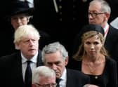 Former British Prime Minister Boris Johnson, centre left, as his wife Carrie, centre right, walk with other British prime ministers David Cameron, Theresa May and Gordon Brown as they leave Westminster Abbey in London. Picture: Frank Augstein/POOL/AFP via Getty Images