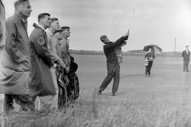 South African player Cobie Legrange hitting into the green at the St Andrews Open Championship in 1964.