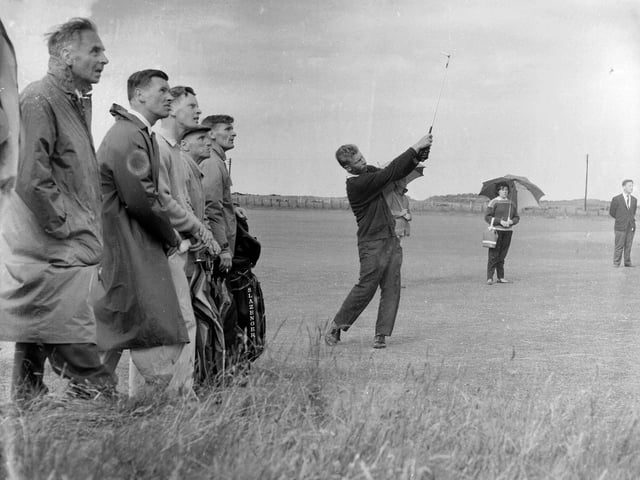 South African player Cobie Legrange hitting into the green at the St Andrews Open Championship in 1964.