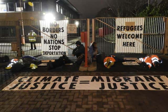 Extinction Rebellion has blocked the front entrance to the Home Office building in Glasgow