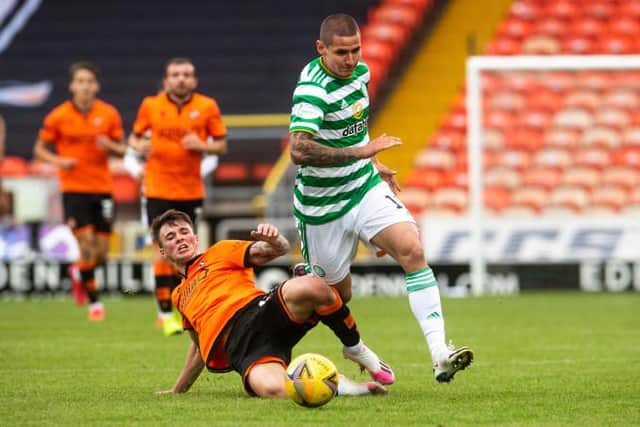Patryk Klimala and Jamie Robson in acion during  the Scottish Premiership match between Dundee Utd  and Celtic at Tannadice. (Photo by Craig Foy / SNS Group)