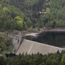 A Lancaster bomber flies over Ladybower reservoir in Derbyshire to mark a previous anniversary of the Second World War Dambusters mission (Picture: Christopher Furlong/Getty Images)