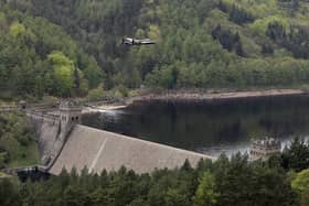 A Lancaster bomber flies over Ladybower reservoir in Derbyshire to mark a previous anniversary of the Second World War Dambusters mission (Picture: Christopher Furlong/Getty Images)