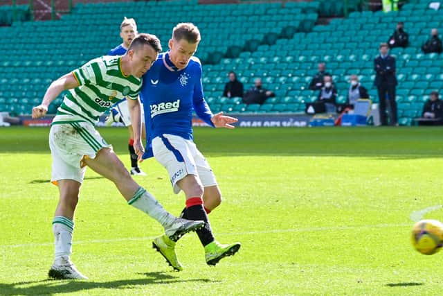 Celtic's David Turnbull has a strike on goal under pressure from Rangers' Steven Davis in a derby wherein rookie manager John Kennedy's gameplan gave his team the tactical superiority over Steven Gerrard's side. (Photo by Rob Casey / SNS Group)