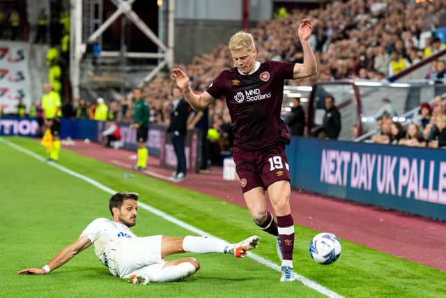 FC Zurich's Antonio Marchesano and Hearts defender Alex Cochrane in action during the Europa League play-off at Tynecastle last month. Photo by Mark Scates / SNS Group