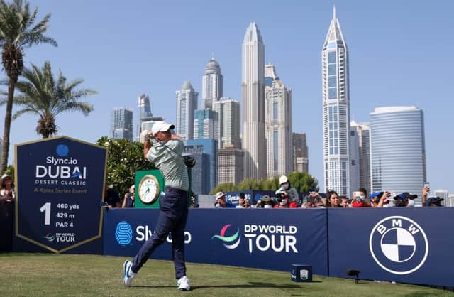 Rory McIlroy tees off in the third round of the Slync.io Dubai Desert Classic at Emirates Golf Club. Picture: Luke Walker/Getty Images.