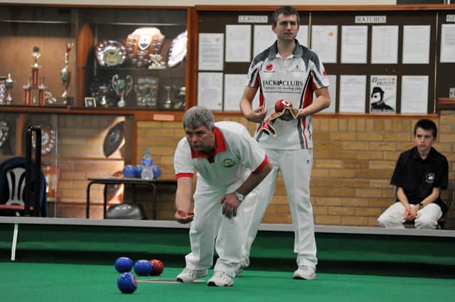 Bowlers compete during matches at the North Notts Arena