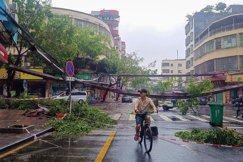 Heavy rain has descended upon the vast southern province of Guangdong in recent days, swelling rivers and raising fears of severe flooding that state media said could be of the sort only "seen around once a century".