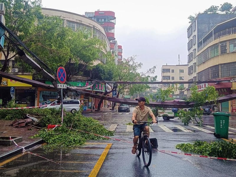 Heavy rain has descended upon the vast southern province of Guangdong in recent days, swelling rivers and raising fears of severe flooding that state media said could be of the sort only "seen around once a century".