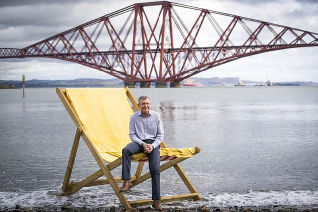 Liberal Democrat leader Willie Rennie, well known for imaginative photo opportunities, relaxes in a giant deckchair at the launch of his party's campaign.