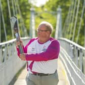 Paul Bush, chairman of Commonwealth Games Scotland, with the Queen's baton ahead of Birmingham 2022. (Photo by Euan Cherry/Getty Images for the Birmingham 2022 Queen's Baton Relay )