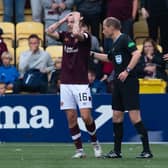Hearts players protest the winning goal, thinking it was offside. (Photo by Paul Devlin / SNS Group)