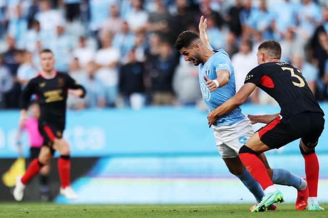 Rangers' Croatian defender Borna Barisic vies with Malmo's Croatian forward Antonio Colak.
