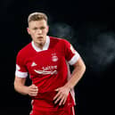 Dundee have been linked with a move for ex-Aberdeen striker Sam Cosgrove.