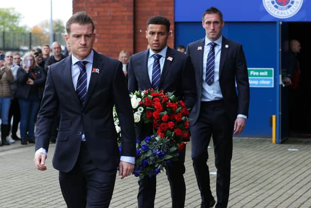 Rangers players Steven Davis, James Tavernier and Allan McGregor lay a wreath in memory of Walter Smith. (Photo by Alan Harvey / SNS Group)