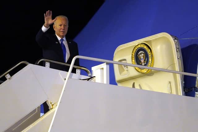President Joe Biden boards Air Force One at Edinburgh Airport after attending the UN Climate Change Conference COP26 on Tuesday, Nov. 2, 2021. (Image credit: AP Photo/Evan Vucci)