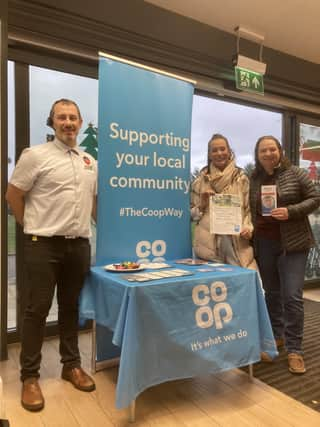 Alan Porter, Hill of Banchory Co-op store manager, Kay McCombie, Banchory Amateur Swimming Club and Kim Scott, SCILL.